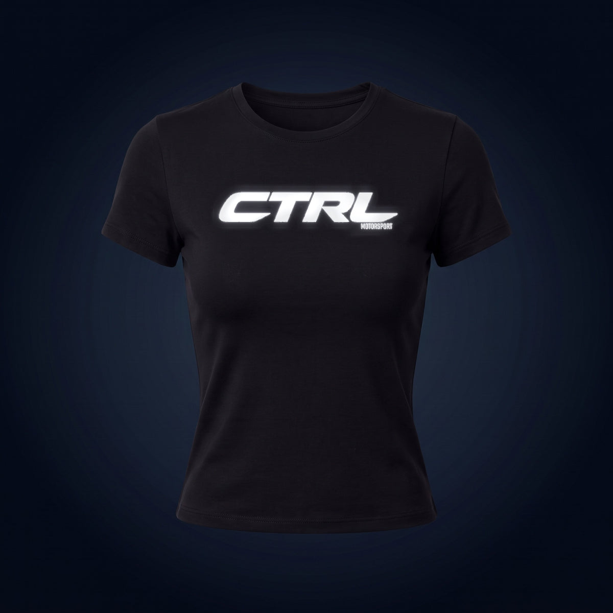Black CTRL Baby Tee Short Sleeve, front, under camera flash at night, the CTRL logo lights up
