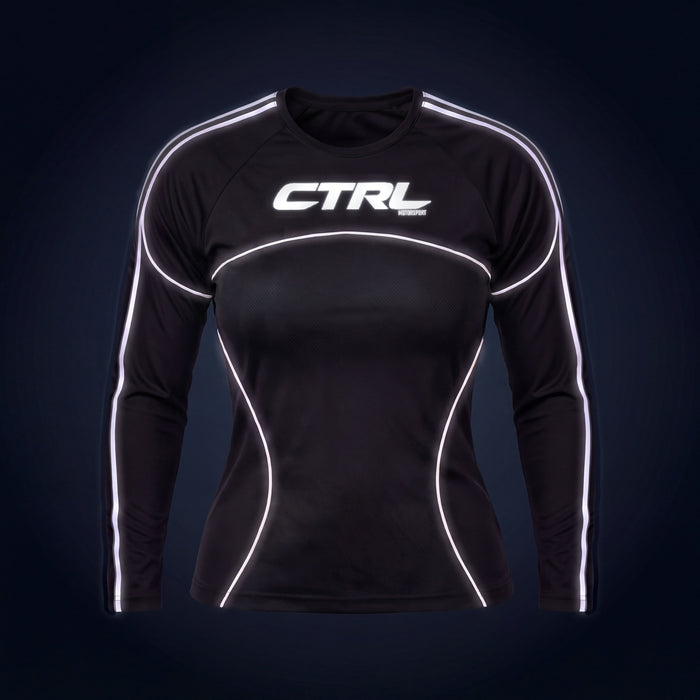 Black CTRL Women's Jersey Long Sleeve, front, under camera flash at night, the reflective lines and logo light up